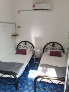 Postel nebo postele na pokoji v ubytování Debunga Chalet