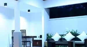 a view of a living room with a large window at Evita Villas in Sukawati