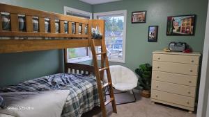 Postel nebo postele na pokoji v ubytování Bird's View Home