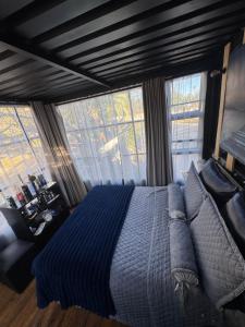 TV a/nebo společenská místnost v ubytování The Glass house