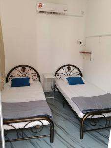 Postel nebo postele na pokoji v ubytování Debunga Chalet + 25 fotografií