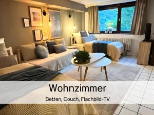 Postel nebo postele na pokoji v ubytování EifelZeit 3 + 10 fotografií