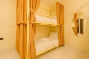 Ένα ή περισσότερα κρεβάτια σε δωμάτιο στο 3 Raahi Varanasi +7 φωτογραφίες