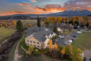 an aerial view of a building with a mountain in the background at Comfort Inn & Suites Carbondale on the Roaring Fork in Carbondale