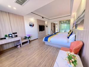 TV a/nebo společenská místnost v ubytování Wang Tian Shu Value Resort Hotel