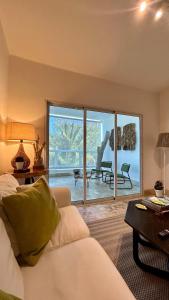 Ένα ή περισσότερα κρεβάτια σε δωμάτιο στο Beautiful 2 bedroom apartment Playa Nueva Romana