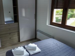 Postel nebo postele na pokoji v ubytování Casa Obregón Cabárceno 3000