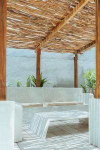 Posezení v ubytování K2 by Ceilao Villas