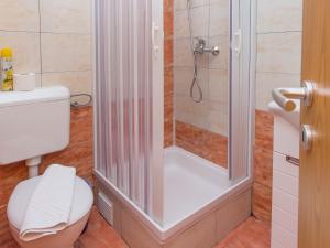 a bathroom with a shower with a white toilet at Villa Valentina in Zadar +70 photos