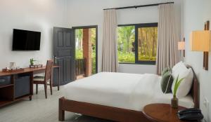 Μια τηλεόραση ή/και κέντρο ψυχαγωγίας στο Green Morodoc Garden Hotel