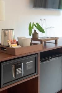 Η κουζίνα ή μικρή κουζίνα στο Green Morodoc Garden Hotel