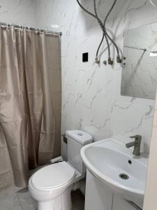 Koupelna v ubytování BUGU Guest House