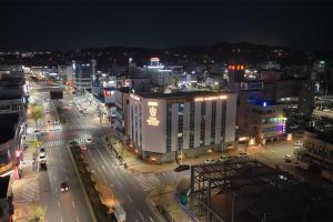 a city at night with a lot of traffic at 호텔 마리스테이 태안 in Taean