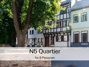 a sign that reads no quarter in front of a building at N5Quartier in Bad Münstereifel