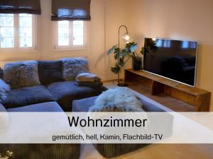 TV a/nebo společenská místnost v ubytování N5Quartier