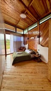 Ένα ή περισσότερα κρεβάτια σε δωμάτιο στο The WildFoot Cabins