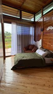 Ένα ή περισσότερα κρεβάτια σε δωμάτιο στο The WildFoot Cabins