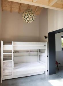 Ένα ή περισσότερα κρεβάτια σε δωμάτιο στο Belle Villa Pointe du Ferret - R170 +2 φωτογραφίες