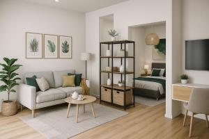 a living room with a couch and a bed at Ferienwohnung Neuwied in Neuwied