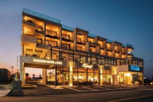 a large building with a lot of windows at Tropical Hideaway in Seogwipo