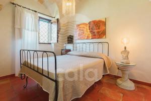 En eller flere senge i et værelse på Villa Alièe piscina privata - By Cala Salento + 46 billeder