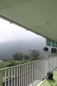 a view from the balcony of a house at Wong Pai Ton Villa in Ngadisari