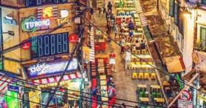an overhead view of a store with people walking in the street at Hanoi Fiesta Central Hotel and Spa in Hanoi