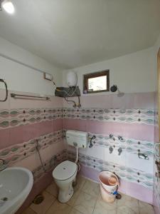 Koupelna v ubytování Solriddim Cafe & Stays