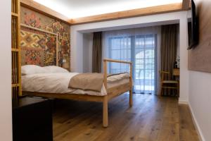 Postel nebo postele na pokoji v ubytování MonteRai