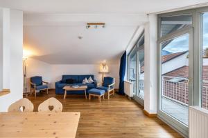 Khu vực ghế ngồi tại Fewo Brünnstein - Zimmer 65