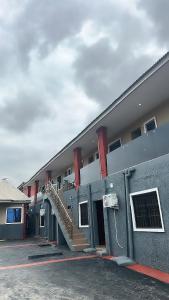 a building with a staircase on the side of it at OA luxury apartment 