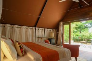 Ένα ή περισσότερα κρεβάτια σε δωμάτιο στο Maadest