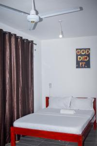 Ένα ή περισσότερα κρεβάτια σε δωμάτιο στο GCG stays +14 φωτογραφίες