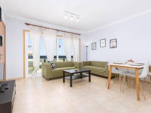 a living room with a couch and a table at My little paradise in Cotillo