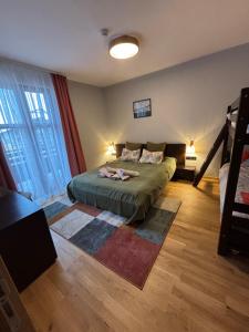 Ένα ή περισσότερα κρεβάτια σε δωμάτιο στο Ski-in ski-SPA at Mountain View +17 φωτογραφίες