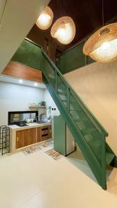 Kuchyň nebo kuchyňský kout v ubytování Aso Living Selatan