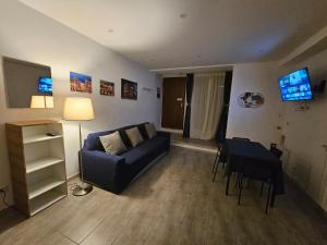 TV a/nebo společenská místnost v ubytování Fabri & Gio Apartment Tor Vergata - Metro C Torrenova