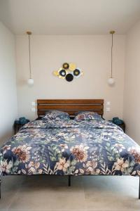 Postel nebo postele na pokoji v ubytování Maison MUGUET 3 SPA-PARKING-COLMAR