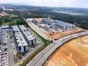 an aerial view of a city with a parking lot at D2303 Camellia Stay, Alanis Near KUL Airport in Sepang