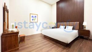 Giường trong phòng chung tại Large Villa Crown Hill Estate F26