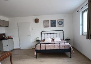 Postel nebo postele na pokoji v ubytování Bois de rose