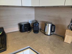 Kuchyň nebo kuchyňský kout v ubytování 3rd Floor High-End 1BR in Lux-Belair with Parking