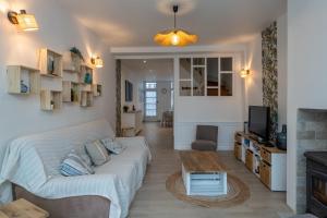 TV a/nebo společenská místnost v ubytování La Bignone - Avec jardin et terrasse + 6 fotografií