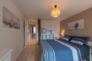 Postel nebo postele na pokoji v ubytování La Bignone - Avec jardin et terrasse