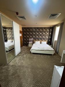 Postel nebo postele na pokoji v ubytování Travel inn