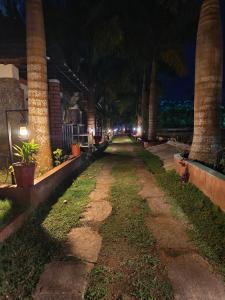 Aed väljaspool majutusasutust Plumeria Resort Coorg