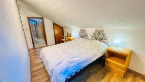 Postel nebo postele na pokoji v ubytování Appartamento Pietro Micca 60 - Affitti Brevi Italia