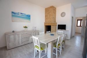 Μια τηλεόραση ή/και κέντρο ψυχαγωγίας στο Villa LUCE DEL SUD Punta Prosciutto