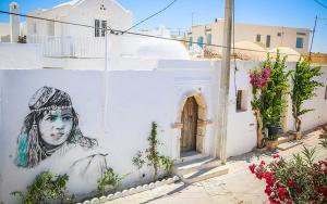 a painting of a woman on the side of a wall at trip to djerba in Djerba