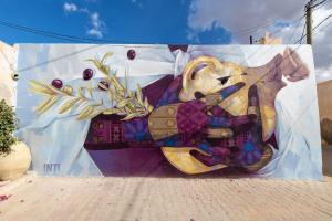 a painting of an elephant on a wall at trip to djerba in Djerba +12 photos